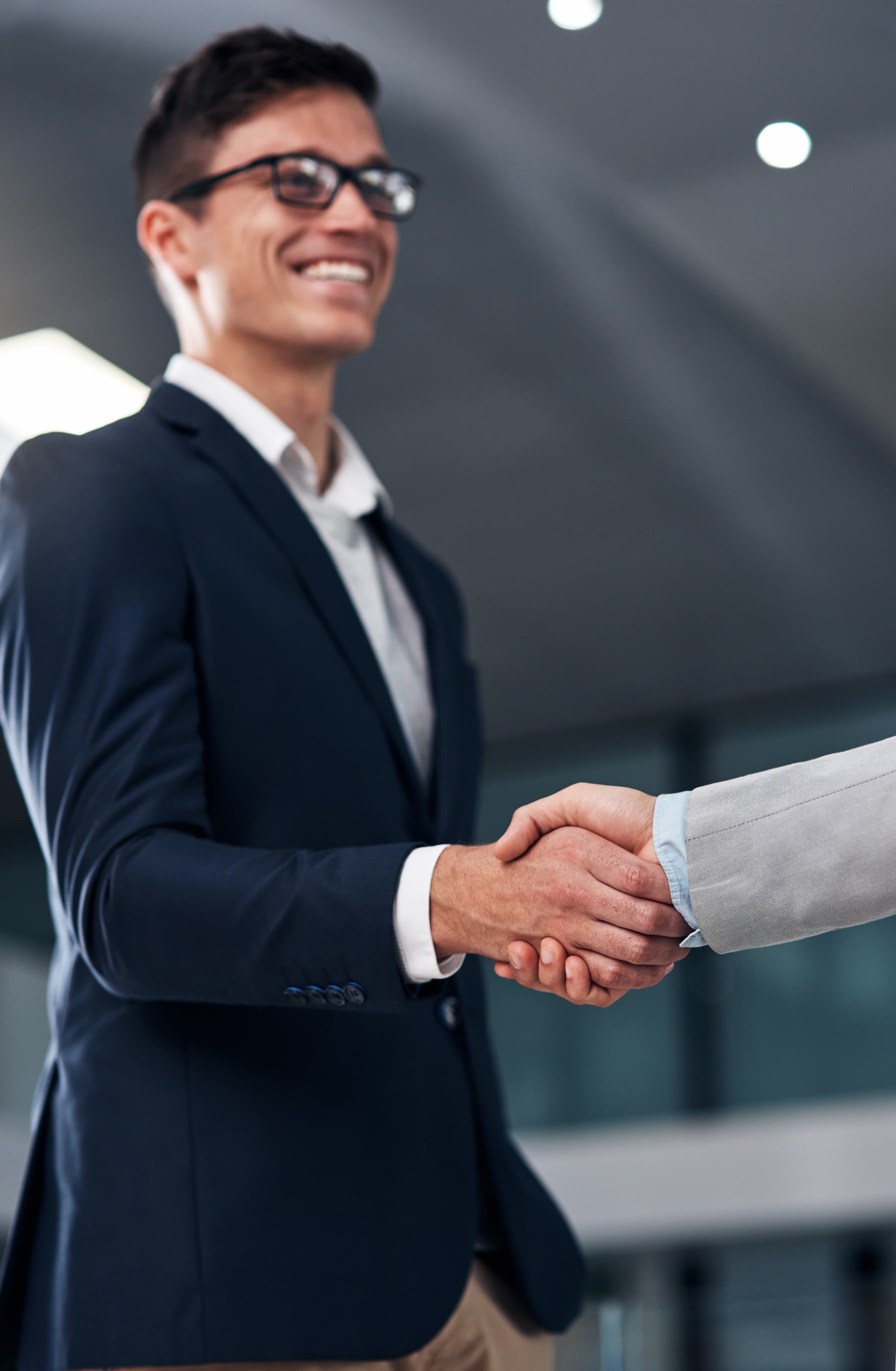 Business partners shaking hands